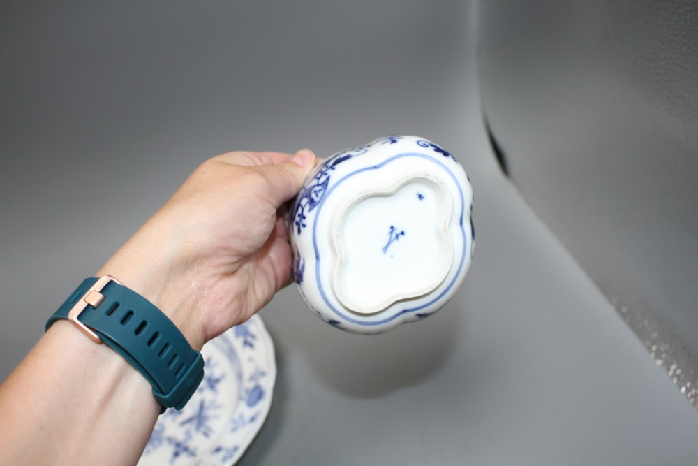 A Meissen blue and white quatrelobed bowl and cover, width 11.5cm, a circular bowl and cover, 8.5cm and a blue and white soup plate, 23